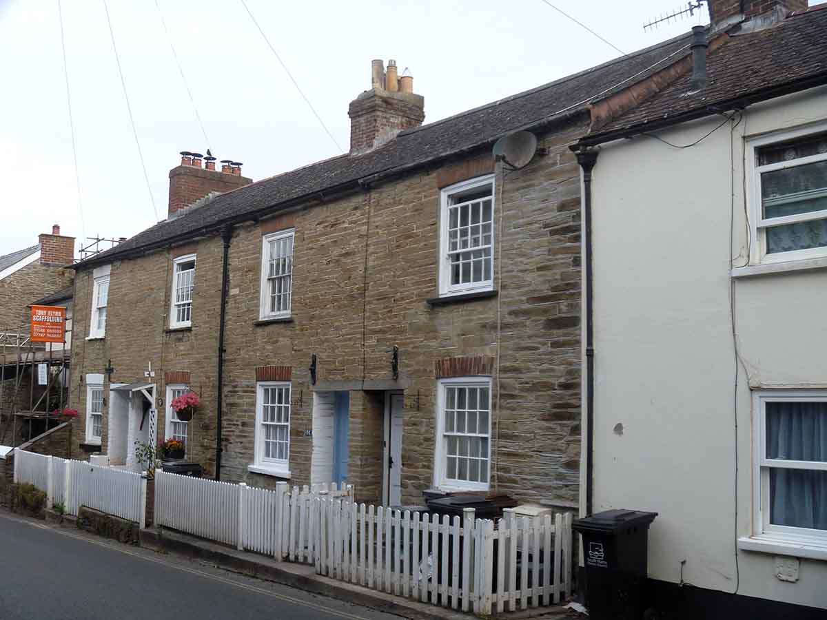 Photo of some terraced houses made of stone, in Plymouth, Devon