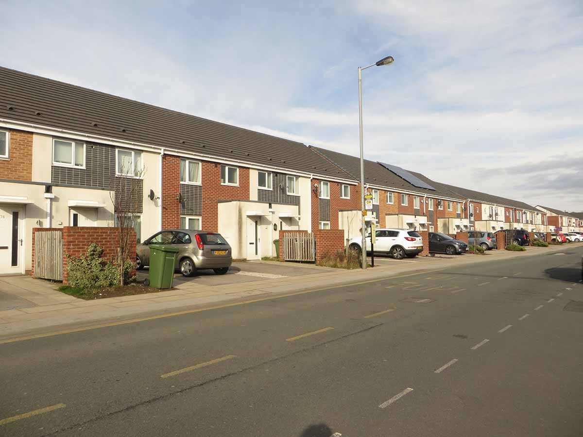 Photo of some bank repossessed terraced houses in Southport, Merseyside.