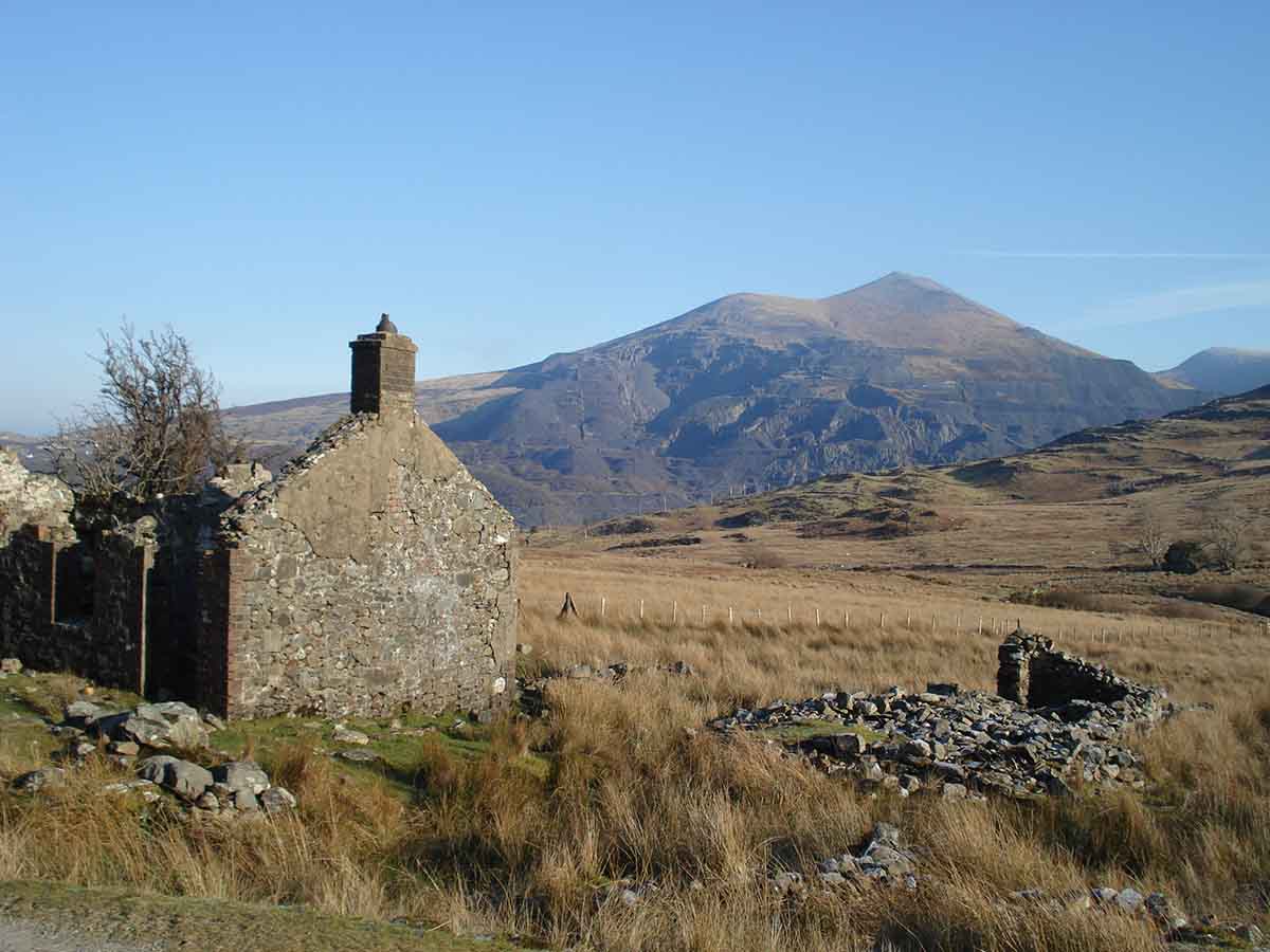 An abandoned house with land for sale in Wales.